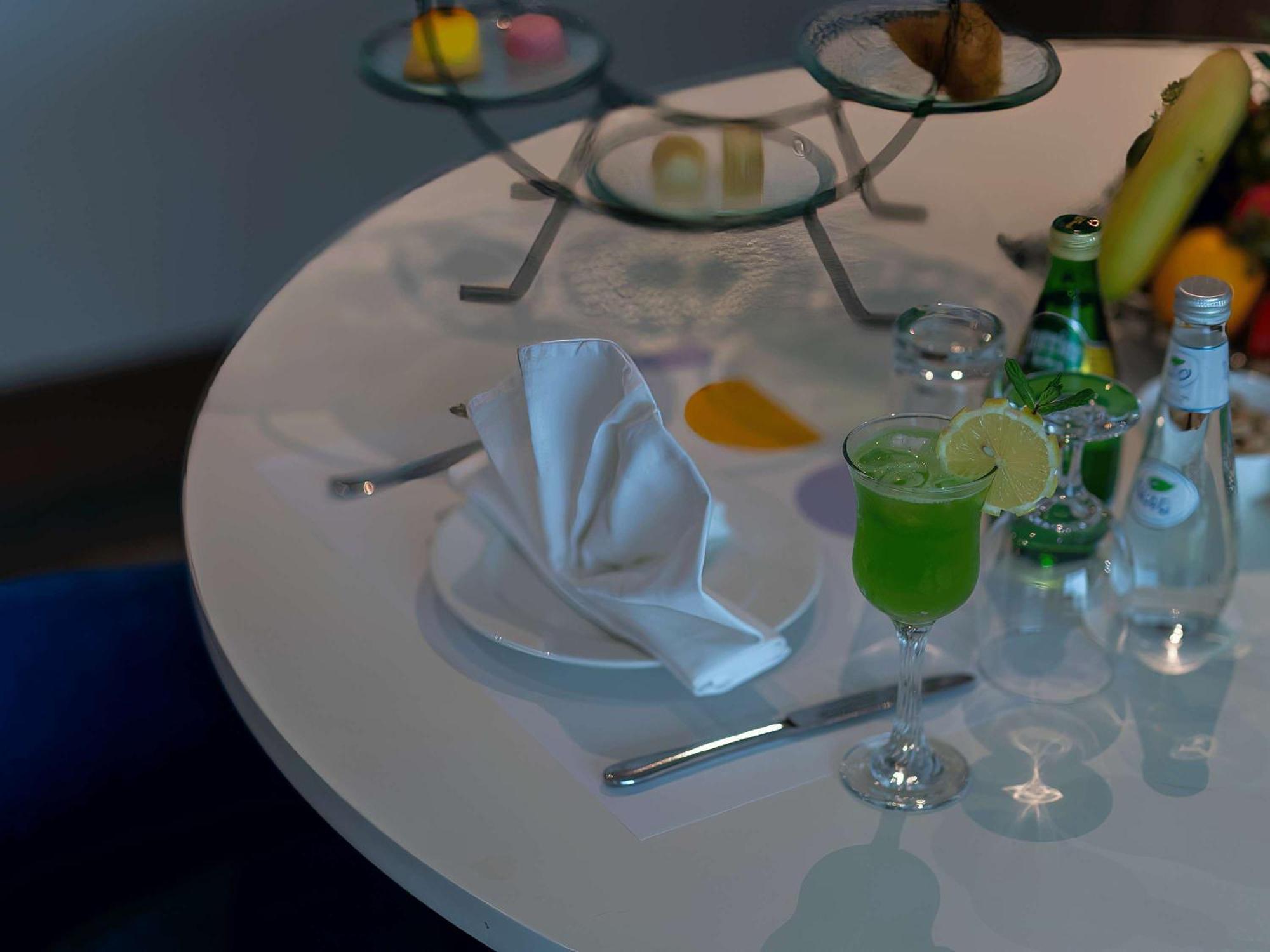 Novotel Jazan Exterior photo A table set for afternoon tea