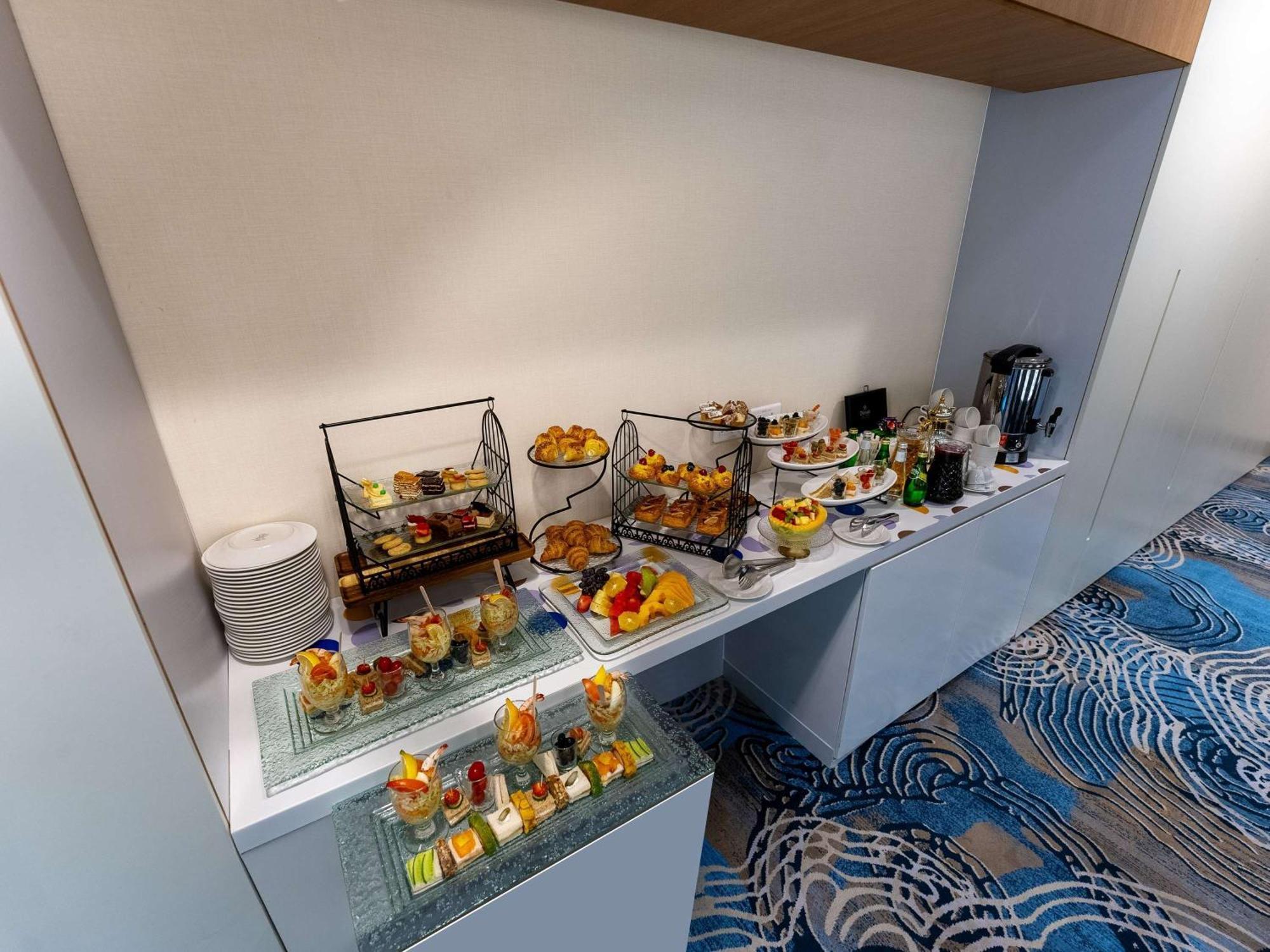 Novotel Jazan Exterior photo A buffet at a hotel
